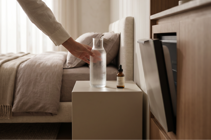 Sleek built-in bedroom fridge with bedside hydration.